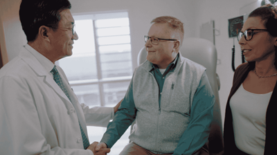 Dr. Isaac Kim meets with a patient