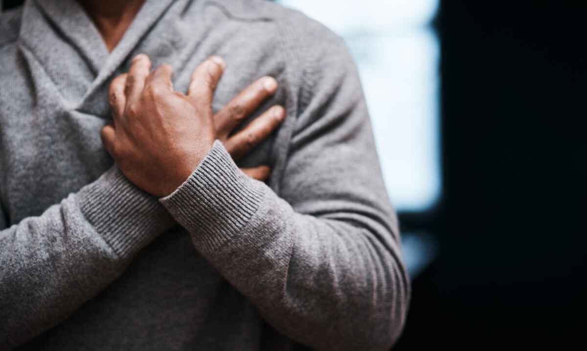 man experiences chest pain