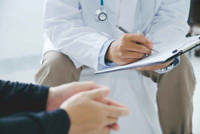 Doctor consults with patient