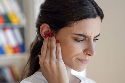 a woman experiencing sudden hearing loss