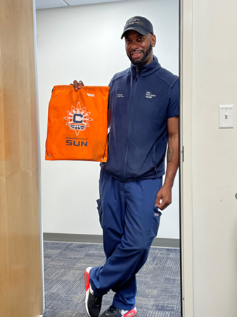 Antonio Robinson, Material Services, picked up four tickets to a Connecticut Sun basketball game that he won during one of the 10 Days of Gratitude daily prize drawings. The names of employees throughout the health system were randomly drawn for tickets to sporting events, attractions and shows.