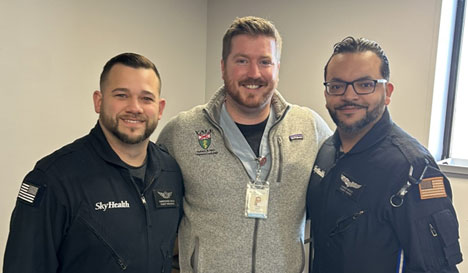 Chris Muolo, critical care transport paramedic; Tyler Wahl, chief perfusionist; and Xavier Velez, RN, critical care transport nurse